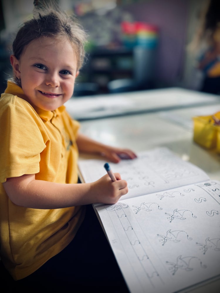 Student working at their desk