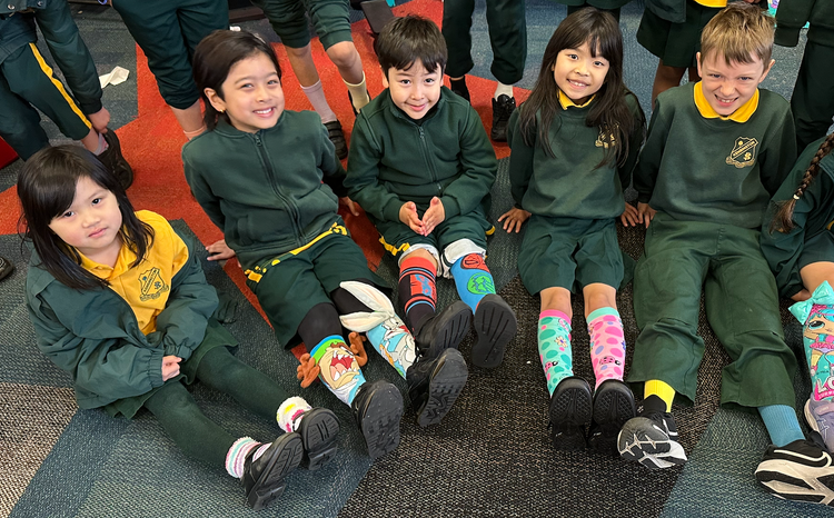 Students showing their odd socks